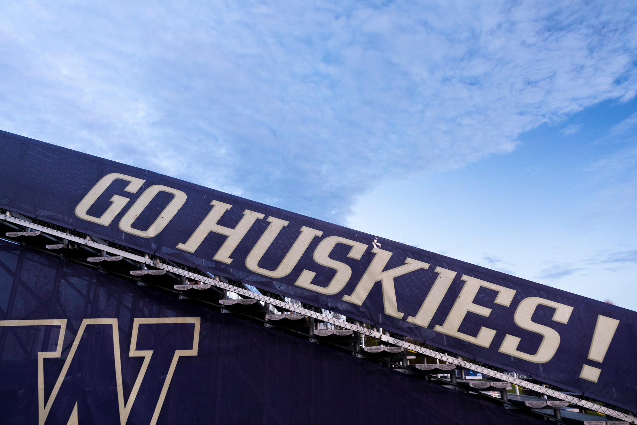A sign reading "Go Huskies!"