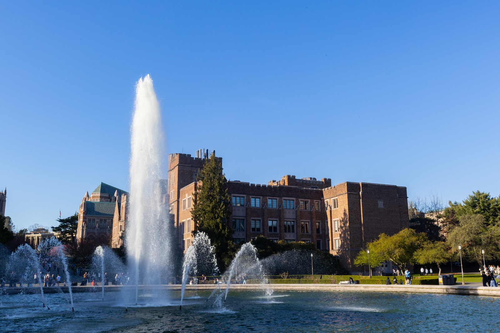 External view of Mary Gates Hall with Drumheller Fountain in the foreground