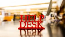 Photo of sign that says Help Desk