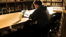 Student studying in library