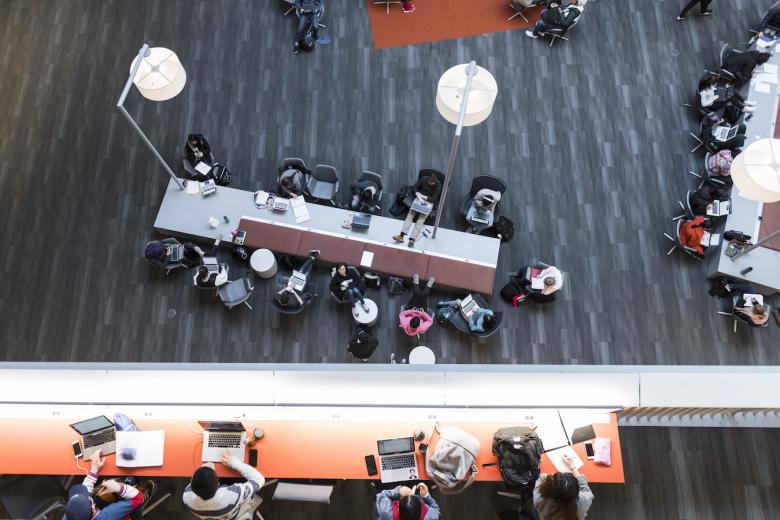 Aerial shot of students studying in Odegaard Library