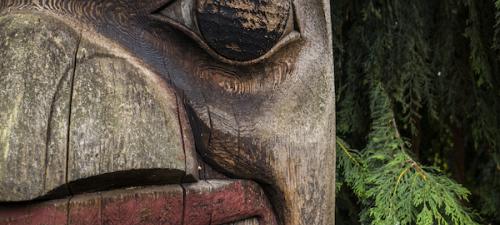 Close up shot of totem carving on UW Seattle campus